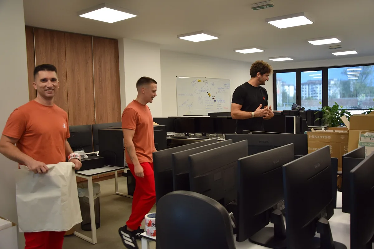 Red Cat commercial movers getting ready to pack an open-plan office