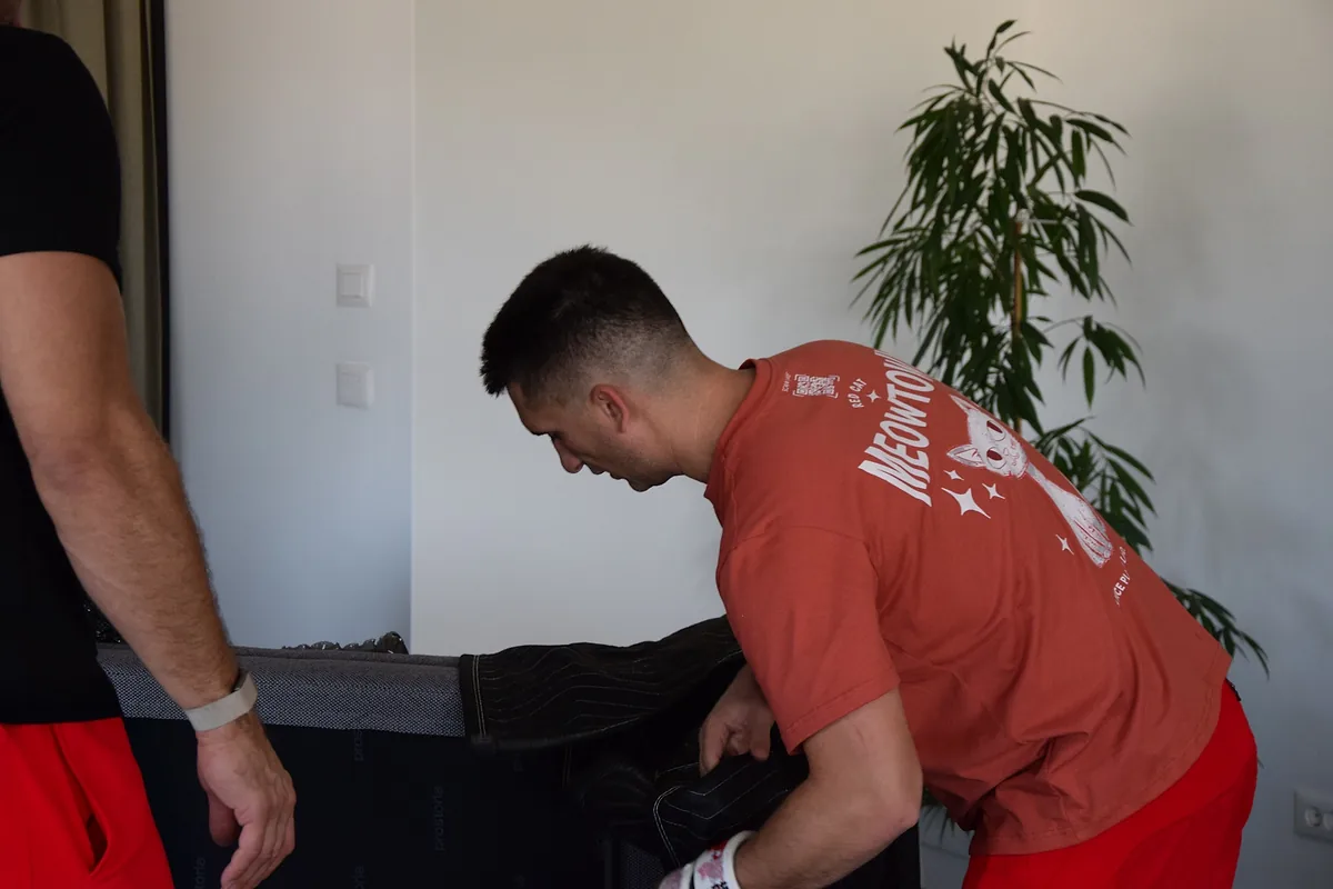 Red Cat event mover wrapping a piece for the venue